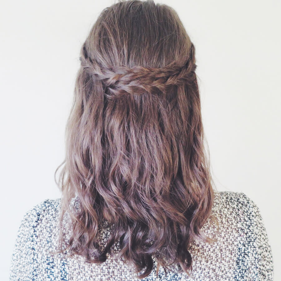 <p>Repeat with the other braid, pulling it over the other one and pin into place so that the hair grips are hidden by your hair. Spray with a little hairspray to hold. </p>