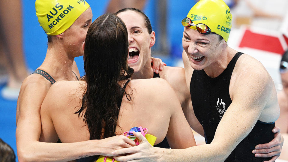 Australia's 4x100m relay team, pictured here celebrating their gold medal and world record.