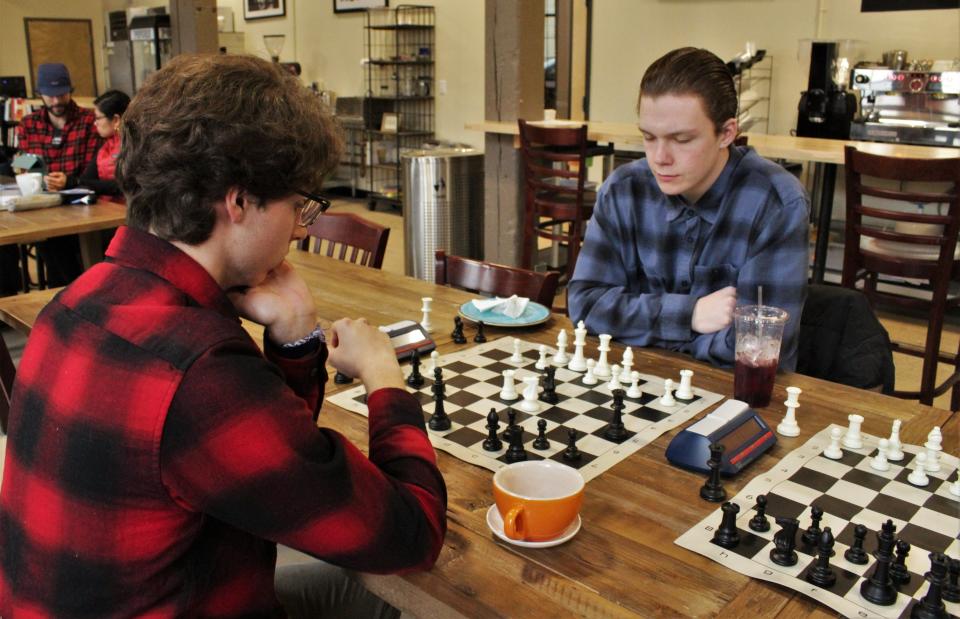 Focused in a "Blitz," a five-minute apiece game, Cullan McHugh of Groton, and Will McHale of Middletown, N.J., are College of Holy Cross students who reserve Sunday mornings for the chess club.