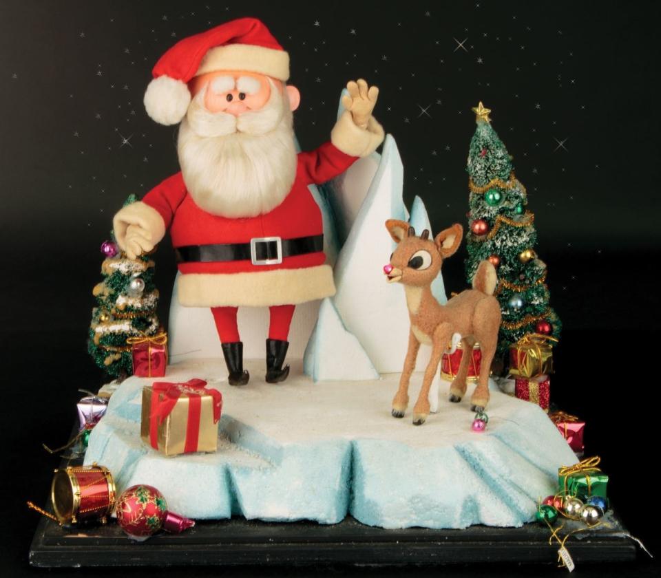 Figures of Santa Claus and Rudolph from the 1964 animated favorite 'Rudolph the Red-Nosed Reindeer' are up for action (Photo: Profiles In History)