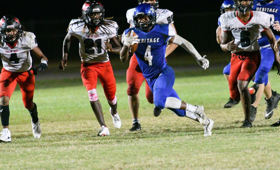LJ Turner of Heritage scores a touchdown during the game against Palm Bay Oct. 12, 2021.  Craig Bailey/FLORIDA TODAY via USA TODAY NETWORK