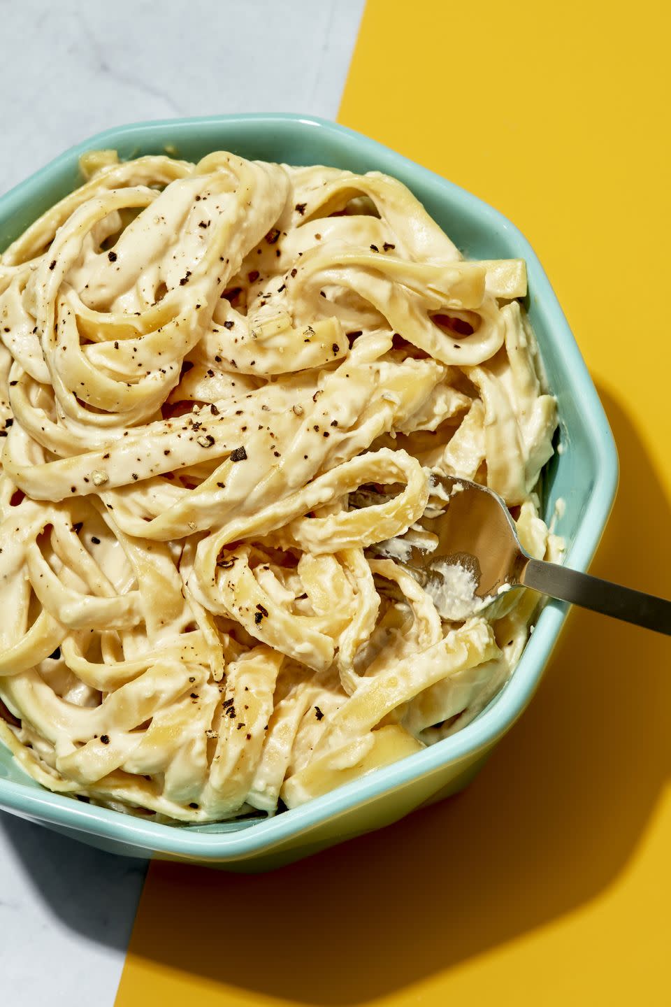 <p>You CAN make an ultra-creamy, velvety smooth <a href="https://www.delish.com/cooking/recipe-ideas/a55312/best-homemade-fettuccine-alfredo-recipe/" rel="nofollow noopener" target="_blank" data-ylk="slk:Alfredo sauce;elm:context_link;itc:0;sec:content-canvas" class="link ">Alfredo sauce</a>, sans dairy, thanks to cashews. Freshly cracked black pepper adds a little burst of heat, but feel free to add some red pepper flakes too. Top with parsley or basil to make it extra-special too.</p><p>Get the <a href="https://www.delish.com/cooking/recipe-ideas/a36790692/vegan-alfredo-sauce-recipe/" rel="nofollow noopener" target="_blank" data-ylk="slk:Cashew Cream Alfredo recipe;elm:context_link;itc:0;sec:content-canvas" class="link "><strong>Cashew Cream Alfredo recipe</strong></a>.</p>