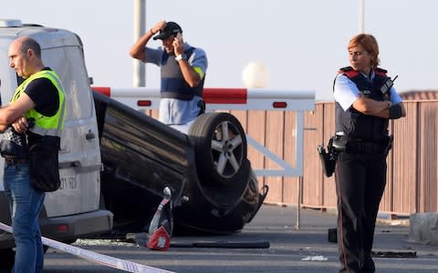 The overturned car used in the attack in Cambrils - Credit: LLUIS GENE/AFP