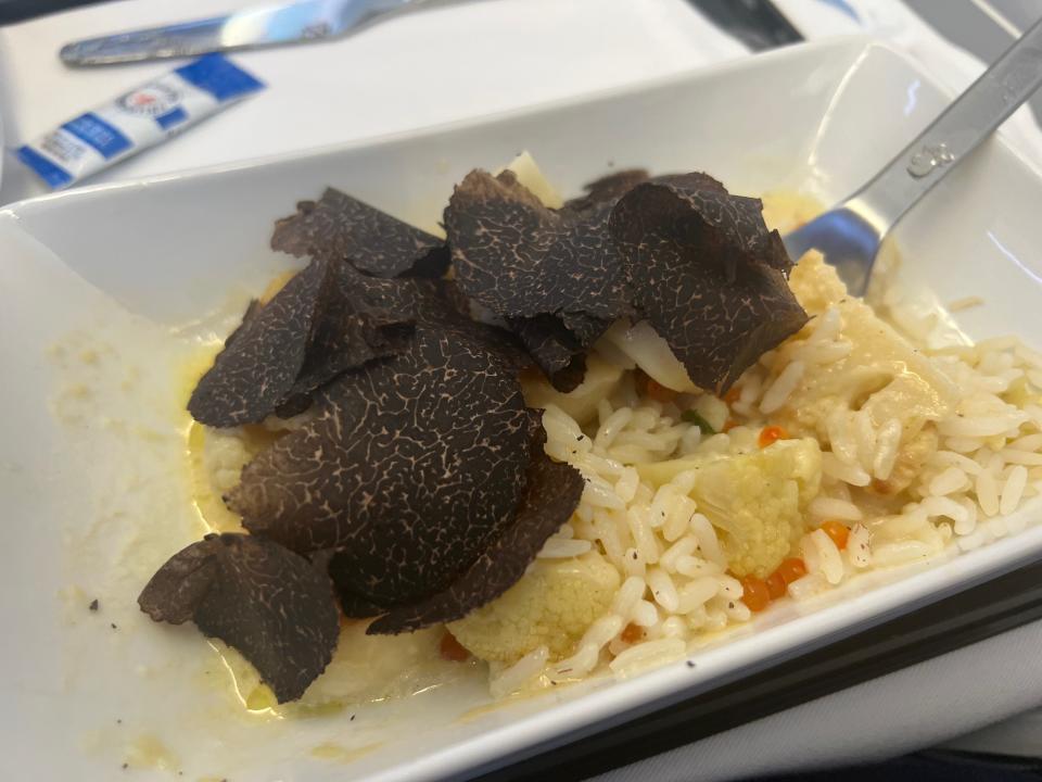 Flying on La Compagnie all-business class airline from Paris to New York — the dish with truffles on top.