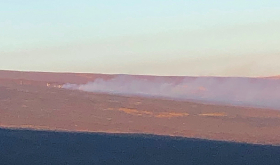 <em>Firefighters tackling the fire on Saddleworth Moor in West Yorkshire (PA)</em>