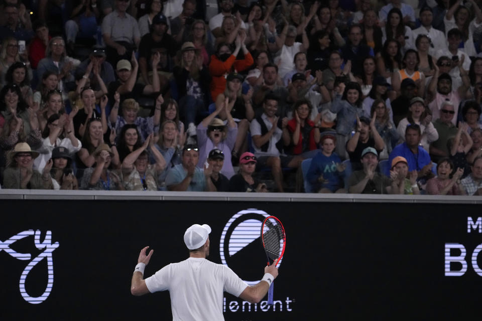 Andy Murray of Britain reacts with the crowd during his third round match against Roberto Bautista Agut of Spain at the Australian Open tennis championship in Melbourne, Australia, Saturday, Jan. 21, 2023. (AP Photo/Ng Han Guan)