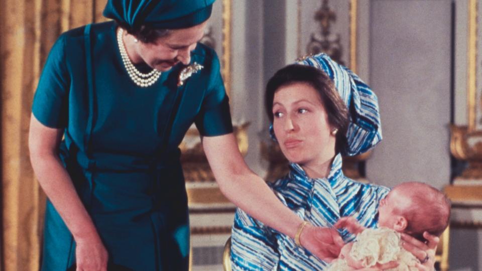 Queen Elizabeth II with her daughter, Princess Anne and grandson, Peter Phillips at the baby boy's christening, 12th December 1977.