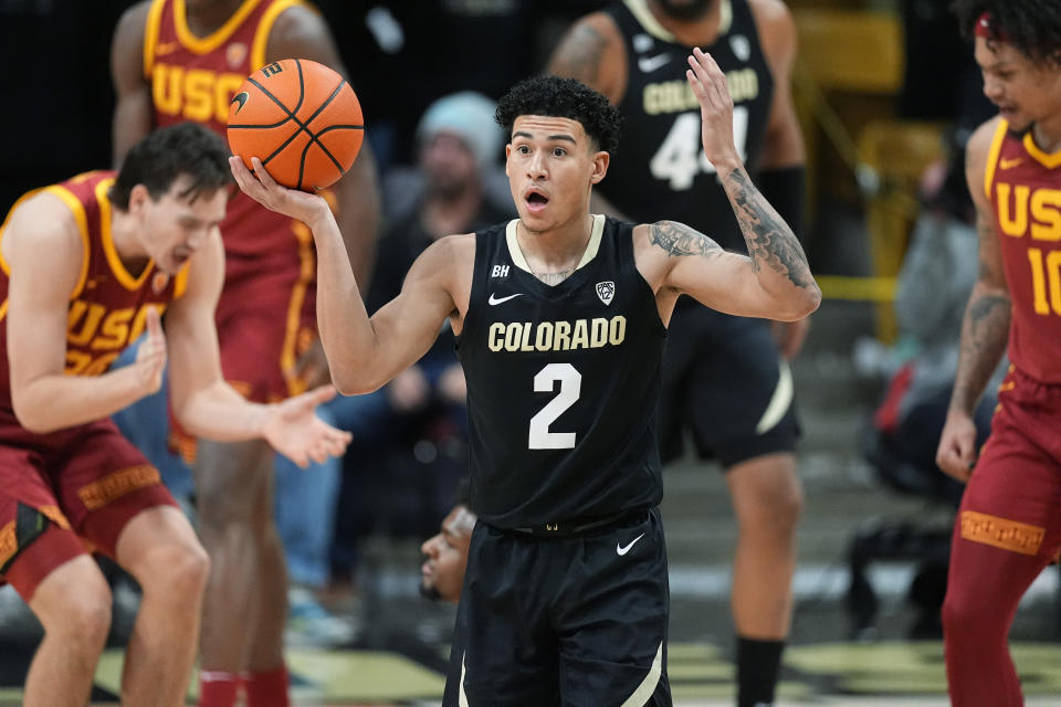 Colorado guard KJ Simpson (2) reacts after being called for a foul in the first half of an NCAA college basketball game against Southern California, Saturday, Jan. 13, 2024, in Boulder, Colo. (AP Photo/David Zalubowski)