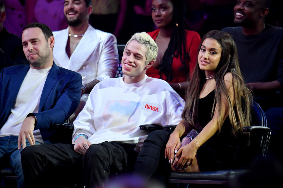 Pete sitting next to Ariana