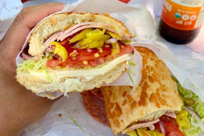 Service journalism reporter Brianna Taylor visits Corti Brothers at 5810 Folsom Blvd., Sacramento on May 13, 2023, with $25. The $8.49 Corti Special is on a Dutch crunch roll with provolone cheese, tomatoes, onions and lettuce.