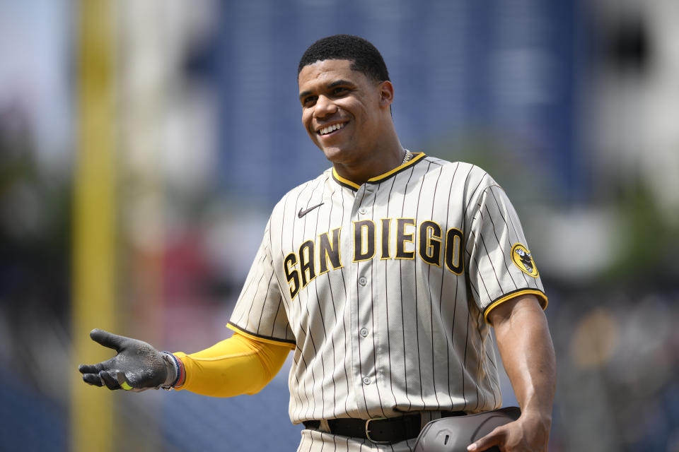 San Diego Padres' Juan Soto reacts at first base during the ninth inning of a baseball game against the Washington Nationals, Sunday, Aug. 14, 2022, in Washington. (AP Photo/Nick Wass)