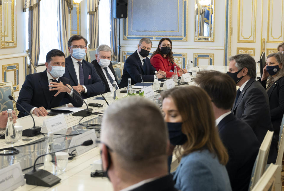 In this photo released by the Ukrainian Presidential Press Office, Ukrainian President Volodymyr Zelenskyy, left, and U.S. Secretary of State Antony Blinken, second right, attend the during their meeting talks in Kyiv, Ukraine, Thursday, May 6, 2021. Secretary of State Antony Blinken has met with top Ukrainian officials in Kyiv and reaffirmed Washington's support for the country in the wake of heightened tensions with Russia. (Ukrainian Presidential Press Office via AP)