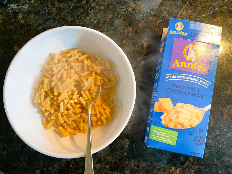 Annie's classic mac 'n' cheese next to its box