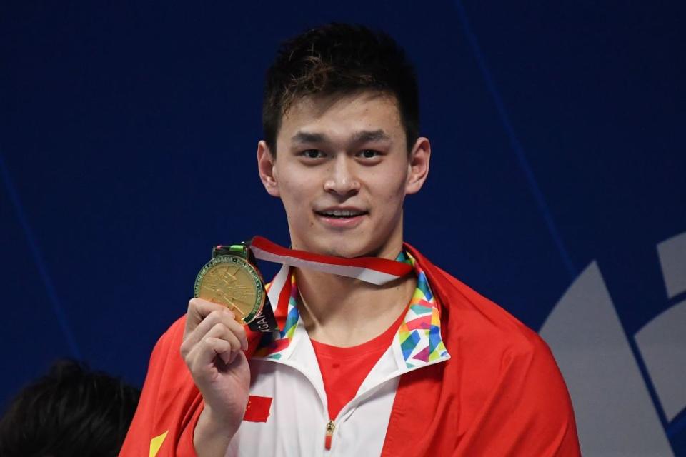 Sun Yang celebrated his medal, and his anthem. (Getty)
