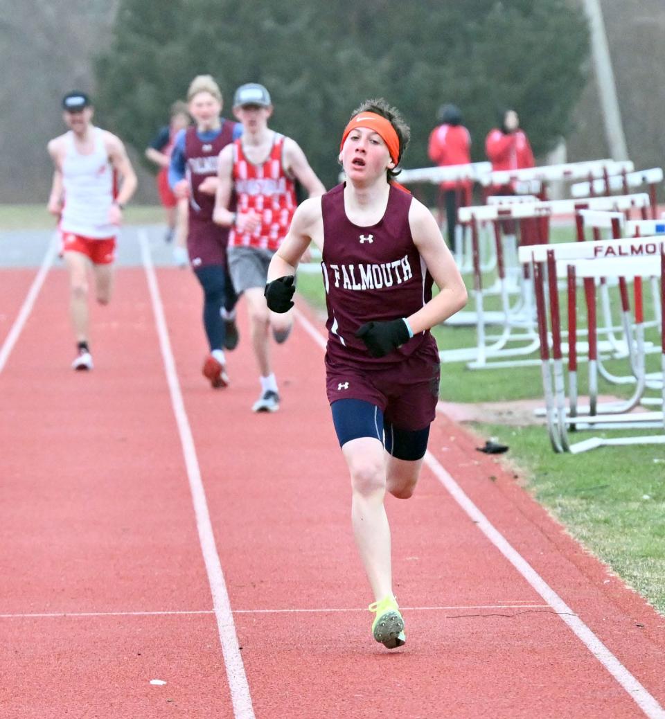 FALMOUTH   04/05/23 Silas Gartner of Falmouth comes to the finish against Barnstable.