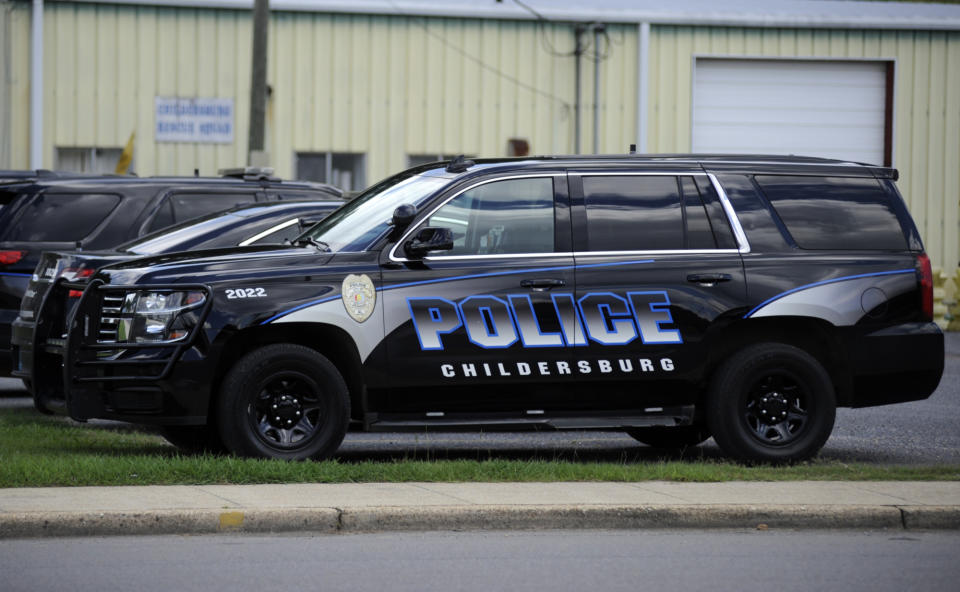 Law enforcement vehicles are shown outside the police station in Childersburg, Ala., on Monday, Aug. 29, 2022. Black pastor Michael Jennings was arrested while watering flowers at a friend's home in the town in May, and his attorney now plans a lawsuit over the incident. (AP Photo/Jay Reeves)