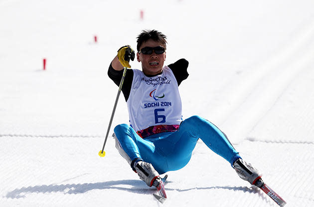 <div>STRUGGLE - Ganbold Batmunkh of Mongolia reacts after crossing the finish line in the Men's 20km Standing event during day three of Sochi 2014 Paralympic Winter Games.</div>