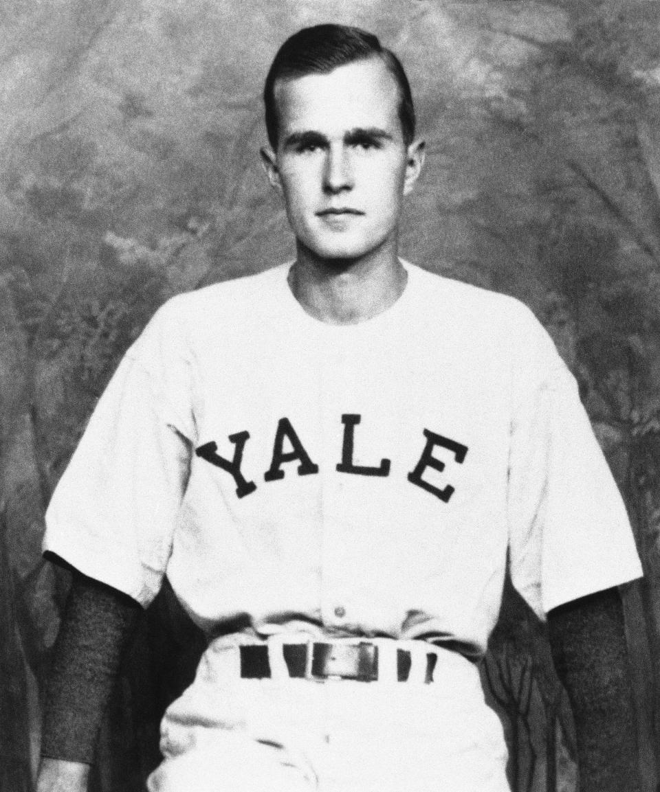 FILE - In this 1947 photo, George H.W. Bush is shown as captain of the Yale baseball team, in New Haven, Conn. Bush played in the first-ever College World Series in 1947. (Bush died Nov. 30, 2018, at the age of 94. Bush was largely known for his work in public office, from his time as a Texas congressman and CIA director to his years in the White House as president and Ronald Reagan's vice president. But the World War II hero and great-grandfather also was an avid skydiver, played in the first-ever College World Series and was the longest-married president in U.S. history.AP Photo/File)