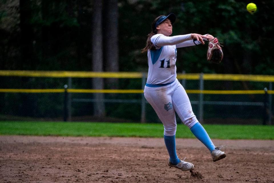 After cleanly fielding a ground ball, Gig Harbor shortstop Riley Peschek makes an off-balance throw across the diamond in hopes of getting an out at first base during a 3A South Sound Conference game against Peninsula on Monday, April 17, 2023, at Peninsula High School in Gig Harbor, Wash.