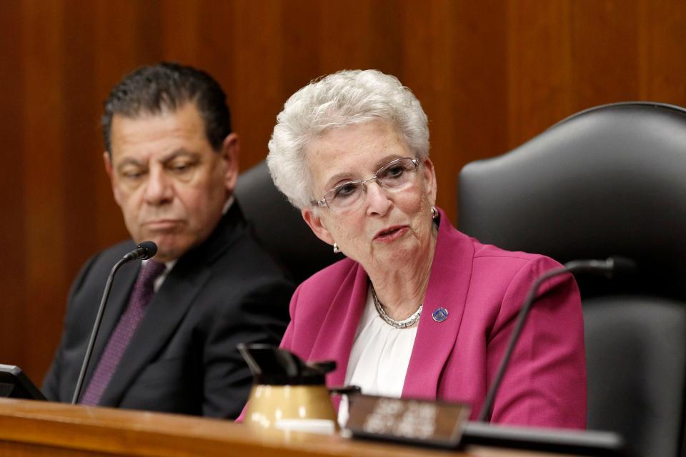 Ocean County Board of Commissioners Director Barbara Jo Crea speaks as new Commissioner Frank Sadeghi looks on during their organizational meeting Wednesday, January 3, 2024, in Toms River.