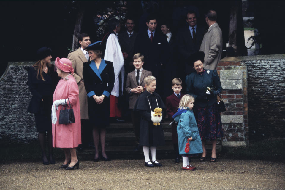 British royals Sarah, Duchess of York, Queen Elizabeth, The Queen Mother (1900-2002), Prince Andrew, Duke of York and Diana, Princess of Wales (1961-1997), Peter Phillips, Zara Phillips, Prince Charles, Anne, Princess Royal, Prince William, and Princess Margaret, Countess of Snowdon (1930-2002) attend the Christmas Day service at St Mary Magdalene Church on the Sandringham estate in Norfolk, England, 25th December 1988. (Photo by Princess Diana Archive/Getty Images)