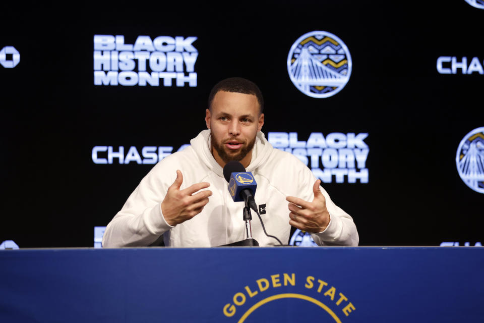 Golden State Warriors' Stephen Curry speaks at a news conference before an NBA basketball game against the Washington Wizards in San Francisco, Monday, Feb. 13, 2023. (AP Photo/Jed Jacobsohn)