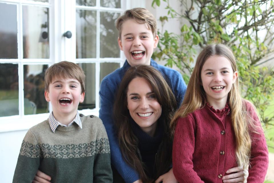 Charlotte appears to be wearing the same cardigan she wore in the contorversial Mother’s Day picture (Reuters)