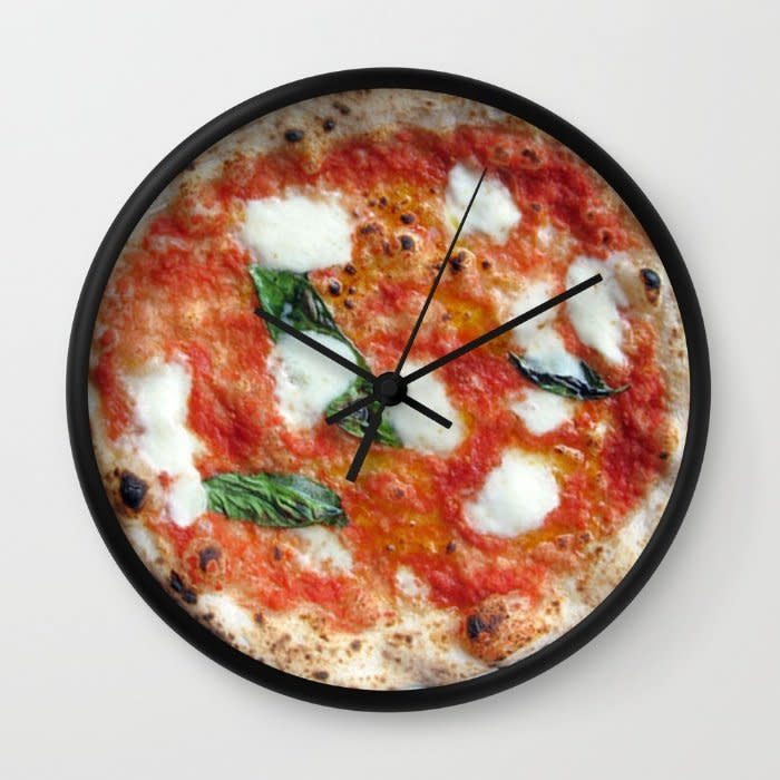 <i>Pizza Margherita Clock, <a href="https://society6.com/product/pizza-margherita-clock_wall-clock#33=284&amp;34=286" target="_blank">$30</a></i>