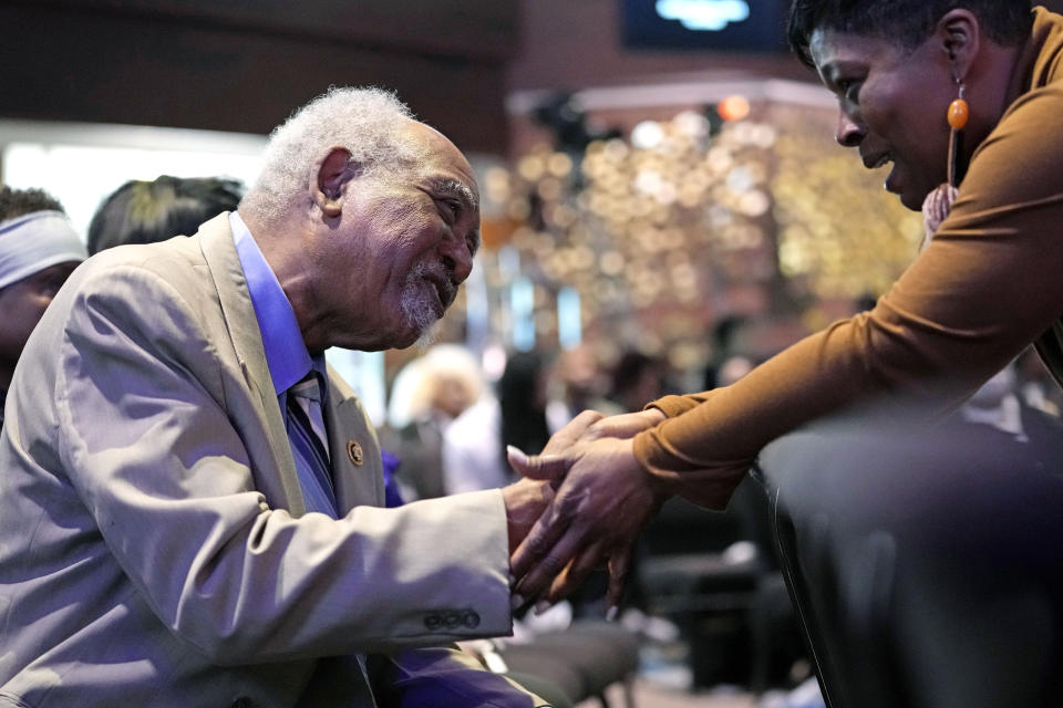 Congressman Danny Davis, left, greets a church member at Fellowship Baptist church in Chicago, Sunday, March 3, 2024. (AP Photo/Nam Y. Huh)