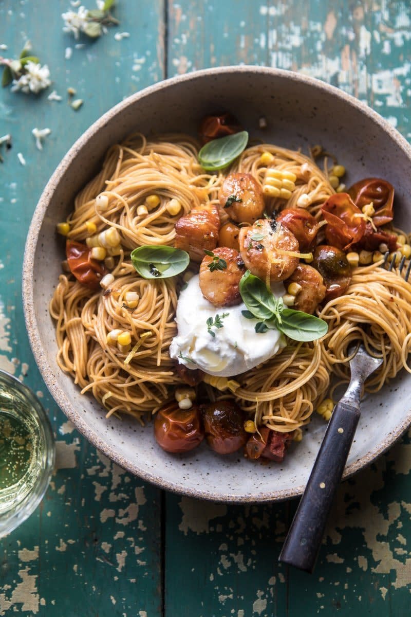 <strong>Get the <a href="https://www.halfbakedharvest.com/browned-butter-scallop-burst-tomato-basil-pasta/?highlight=pasta" target="_blank">Browned Butter Scallop And Burst Tomato Basil Pasta</a> recipe from Half Baked Harvest</strong>