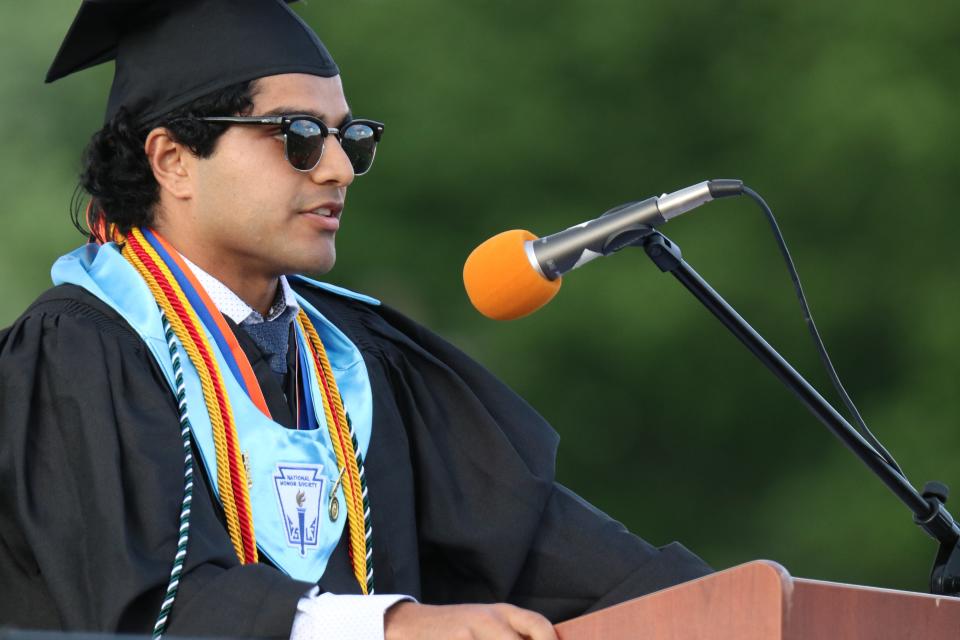 Student speaker Aditya Gaba addresses his fellow graduates at the Pennsbury High School Class of 2022 graduation.

The Pennsbury High School Class of 2022 picked up their diplomas Thursday, June 9 during a commencement ceremony at Falcon Field in Falls. The class included 741 students, who collectively earned about $5.2 million in scholarships.