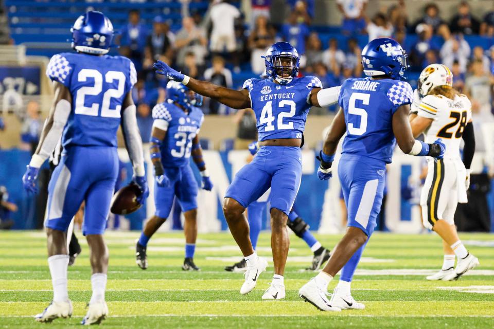 Kentucky linebacker Marquez Bembry (42) celebrates stopping a Missouri drive late in the fourth quarter of an NCAA college football game in Lexington, Ky., Saturday, Sept. 11, 2021. (AP Photo/Michael Clubb)