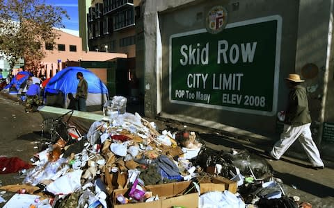 Tents and debris on Skid Row - Credit: MARK RALSTON/AFP/Getty Images