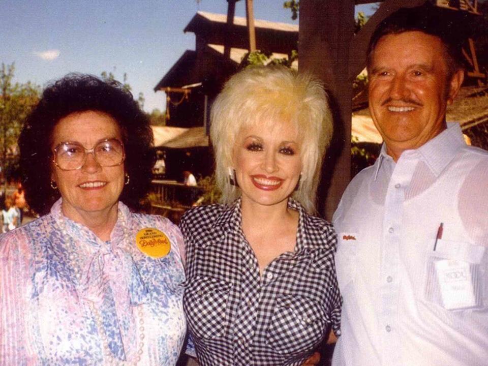 <p>Dolly Parton Instagram</p> Dolly Parton with her parents, Avie and Robert Lee Parton.