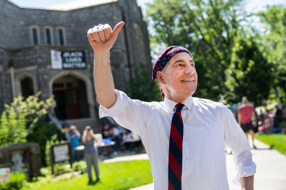 Rep. Jamie Raskin acknowledges spectators along the July 4 parade route in Takoma Park, Maryland, on Tuesday, July 4, 2023. / Credit: Tom Williams