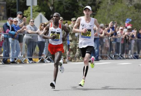 Apr 17, 2017; Boston, MA, USA; Geoffrey Kirui and Galen Rupp race in the 2017 Boston Marathon. Greg M. Cooper-USA TODAY Sports