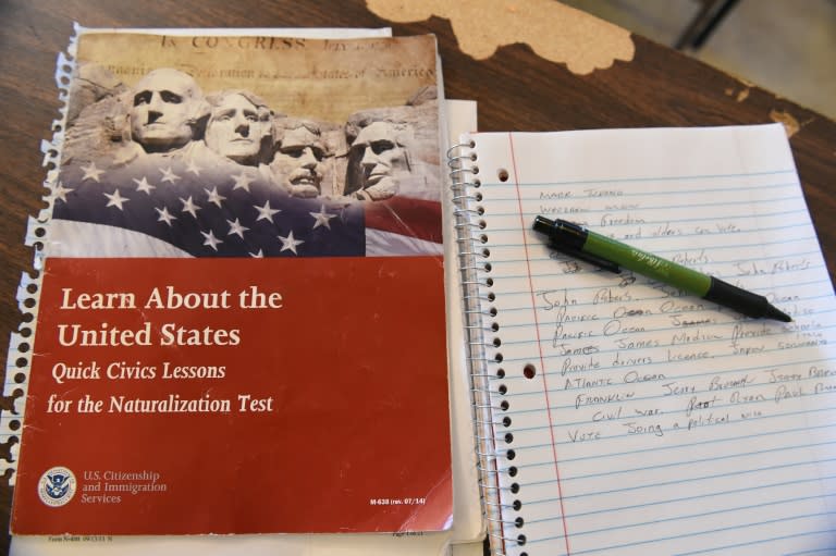 A US citizenship test review booklet and notes are seen during a citizenship test preparation class in Perris, California