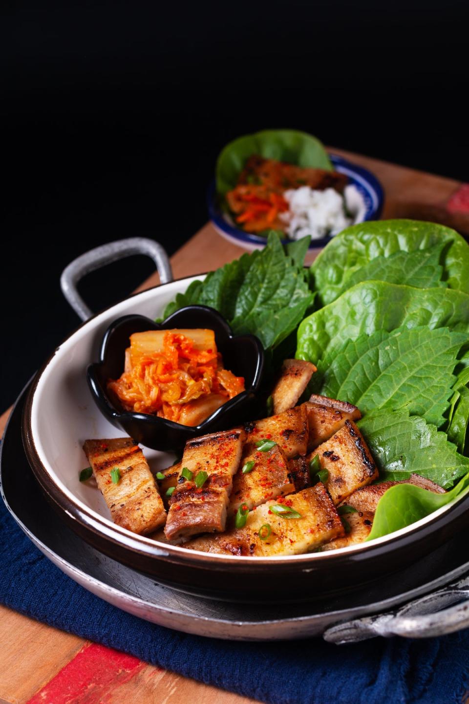 Samgyeopsal means ‘three-layer meat’ and refers to pork belly’s fat cap and the two leaner layers of meat below it (Getty/iStock)