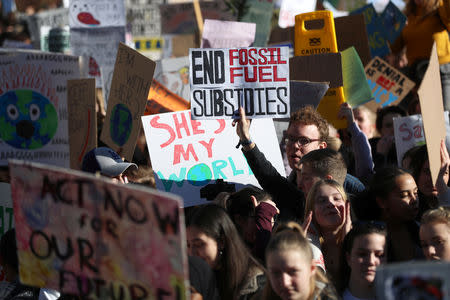 People take part in a "youth strike for climate change" demonstration in London, Britain February 15, 2019. REUTERS/Simon Dawson