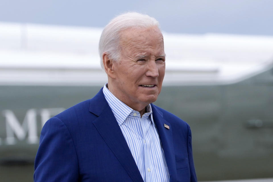 FILE - President Joe Biden boards Air Force One, at Andrews Air Force Base, Md., Jan. 27, 2024. The White House says President Joe Biden will visit the eastern Ohio community that was devastated by a fiery train derailment in February 2023. (AP Photo/Jacquelyn Martin, File)