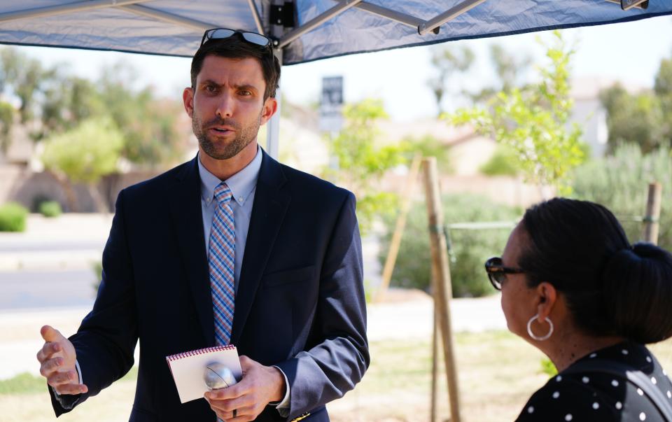 David Hondula, director of heat response and mitigation for the city of Phoenix, speaks about the importance of trees on April 20, 2022, in Phoenix.