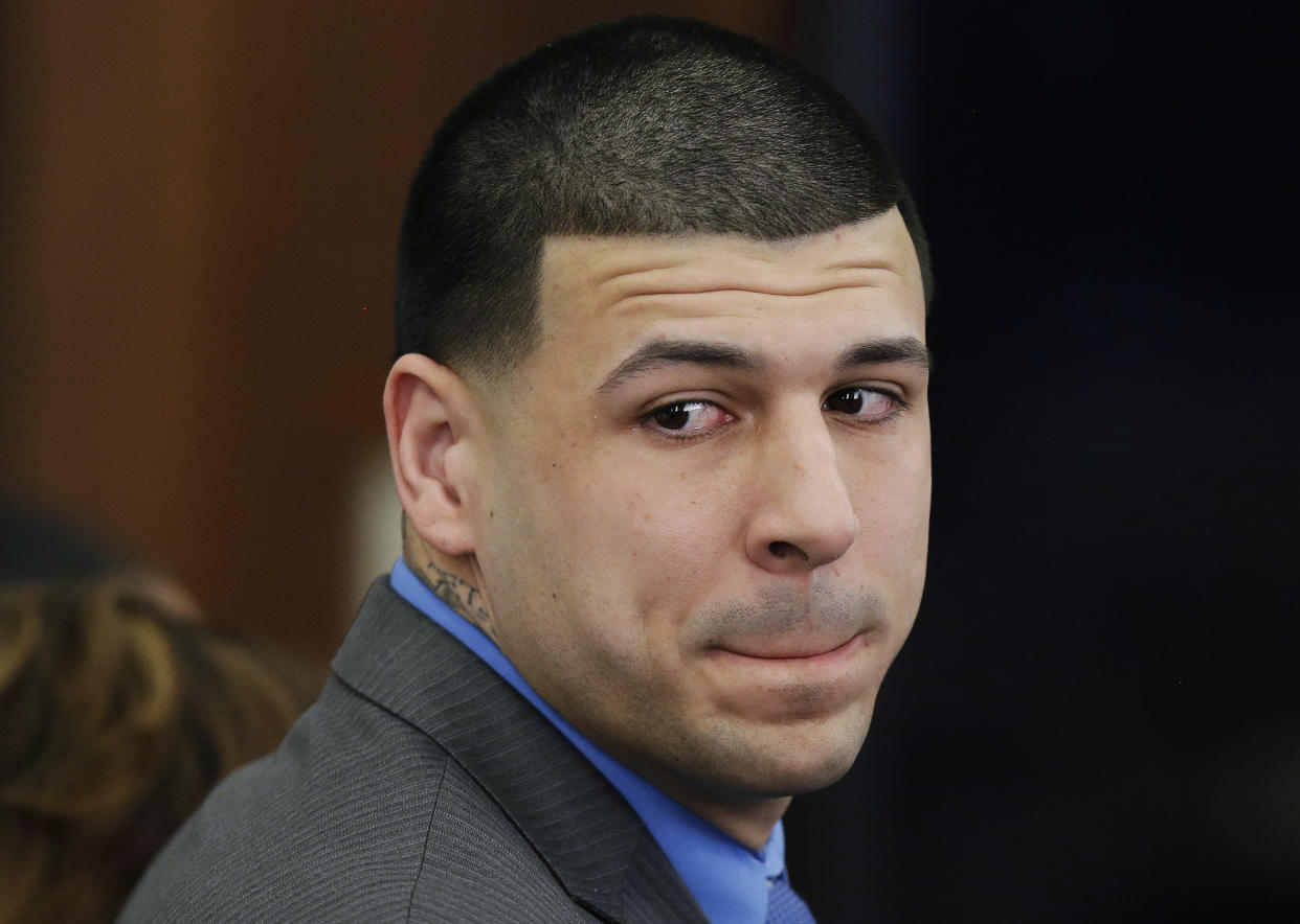 In a new book, attorney Jose Baez, who represented Aaron Hernandez in a double murder trial, tries to paint the tight end in a positive light. (AP)