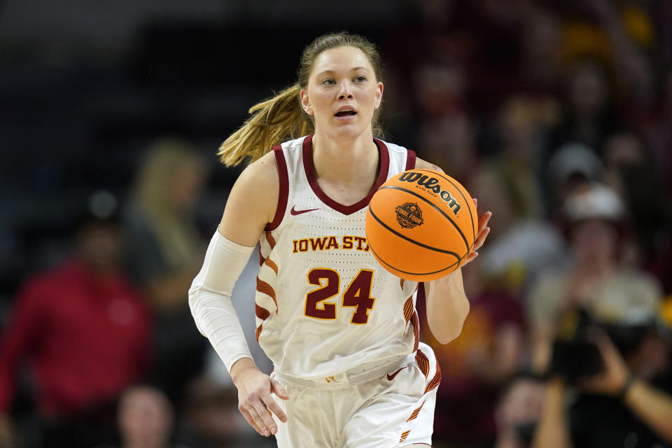 FILE - Iowa State guard Ashley Joens drives up court during the second half of a second-round game against Georgia in the NCAA women's college basketball tournament, Sunday, March 20, 2022, in Ames, Iowa. Joens was named to the women's Associated Press preseason All-America team, Tuesday, Oct. 25, 2022.(AP Photo/Charlie Neibergall, File)