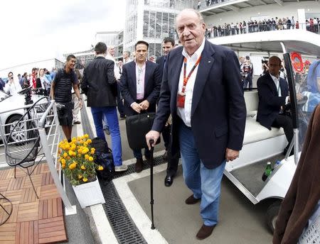 Spanish former King Juan Carlos (C) arrives at the Mexican Formula One Grand Prix at Autodromo Hermanos Rodriguez in Mexico City, October 31, 2015. REUTERS/Henry Romero/Files