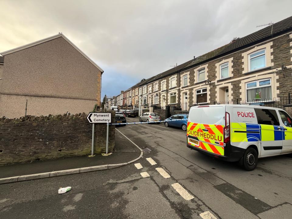 The scene on Moy Road in the village of Aberfan, Merthyr, South Wales, after armed officers were deployed to deal with an assault which has left one in hospital. Picture date: Tuesday December 5, 2023. PA Photo. Police said officers had responded to an incident in Aberfan, South Wales, where schools and a community centre have closed as a precaution. One person was taken to the University Hospital of Wales in Cardiff for treatment. See PA story POLICE Aberfan. Photo credit should read: Rod Minchin/PA Wire