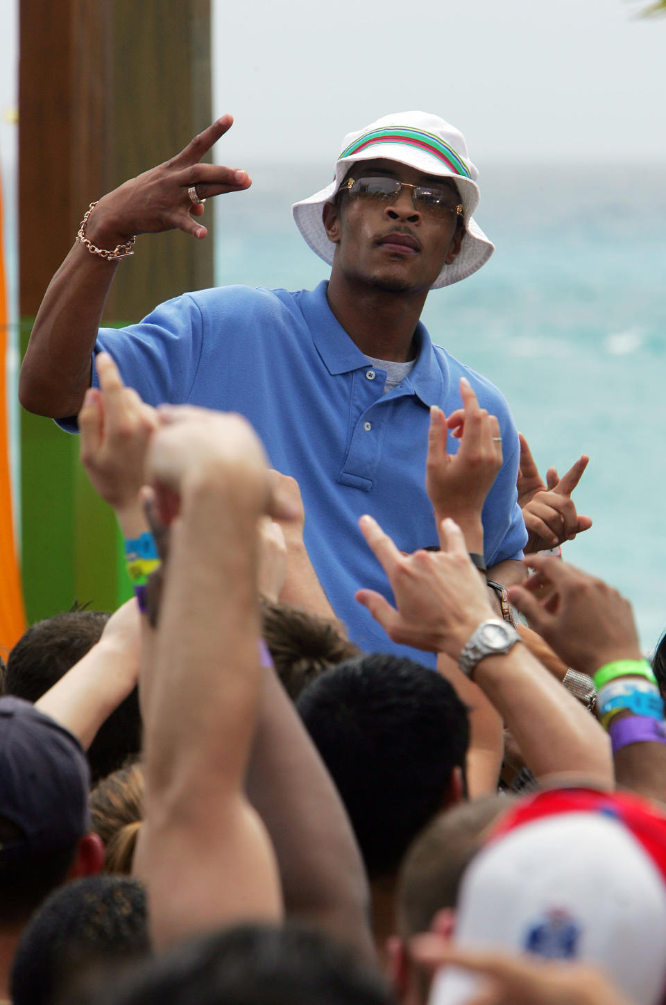 CANCUN, MEXICO - MARCH 9:   (U.S. TABS OUT) Rapper T.I. performs onstage during a taping for MTV Spring Break on the beach at The City nightclub March 9, 2005 in Cancun, Mexico. (Photo by Scott Gries/Getty Images)