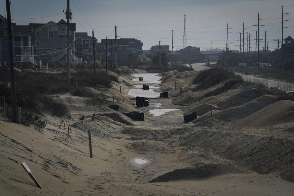 Water and sand cover Seagull Street, which was completely flooded by the waves of the Atlantic in 2022. 