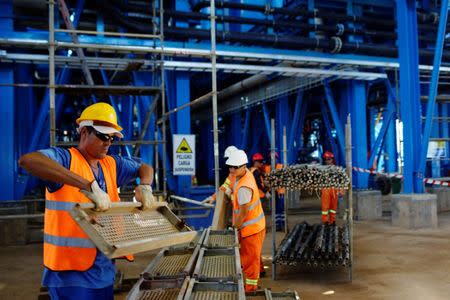 Employees work at the lead and zinc mine Castellanos in Minas de Matahambre, Cuba, July 20, 2017. REUTERS/Alexandre Meneghini