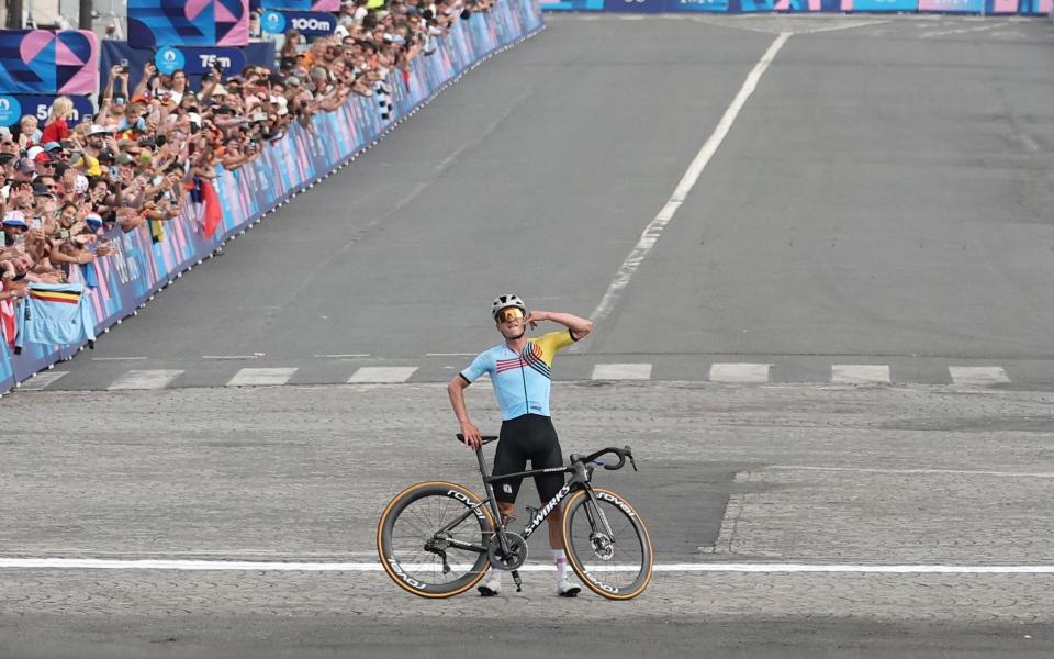 Remco Evenepoel of Belgium celebrates winning the Men's Road Cycling Race of the Paris 2024 Olympic Games