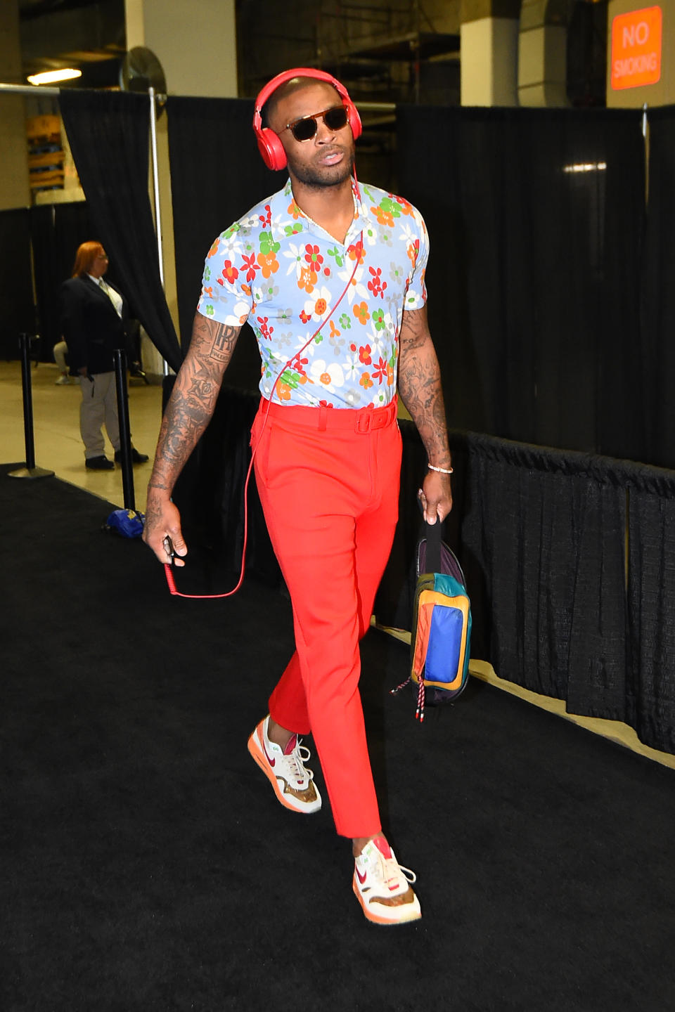 PJ Tucker of the Houston Rockets wears a floral pastel ensemble paired with CLOT x Nike Air Max 1 "Kiss of Death" on April 28, 2019.